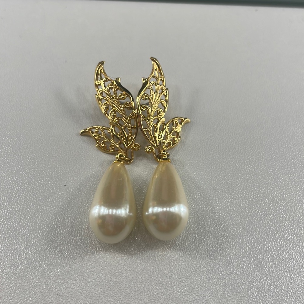 Gold and white studded earrings